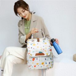 mom and baby travel bag with multiple compartments