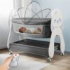 StarAndDaisy Electric Baby Crib Cradle with Mosquito Net, Wooden Legs, and 3 Gear Adjustable Swing with Smart Remote Control - Grey