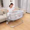 Mastela Deluxe 3-in-1 Baby Bassinet with Adjustable Heights, Mosquito Net, Swing Lock & Storage Pockets - White