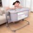 Mastela Newborn Baby Bassinet with Adjustable Heights, Mosquito Net, Swing Lock & Storage Pockets - Grey